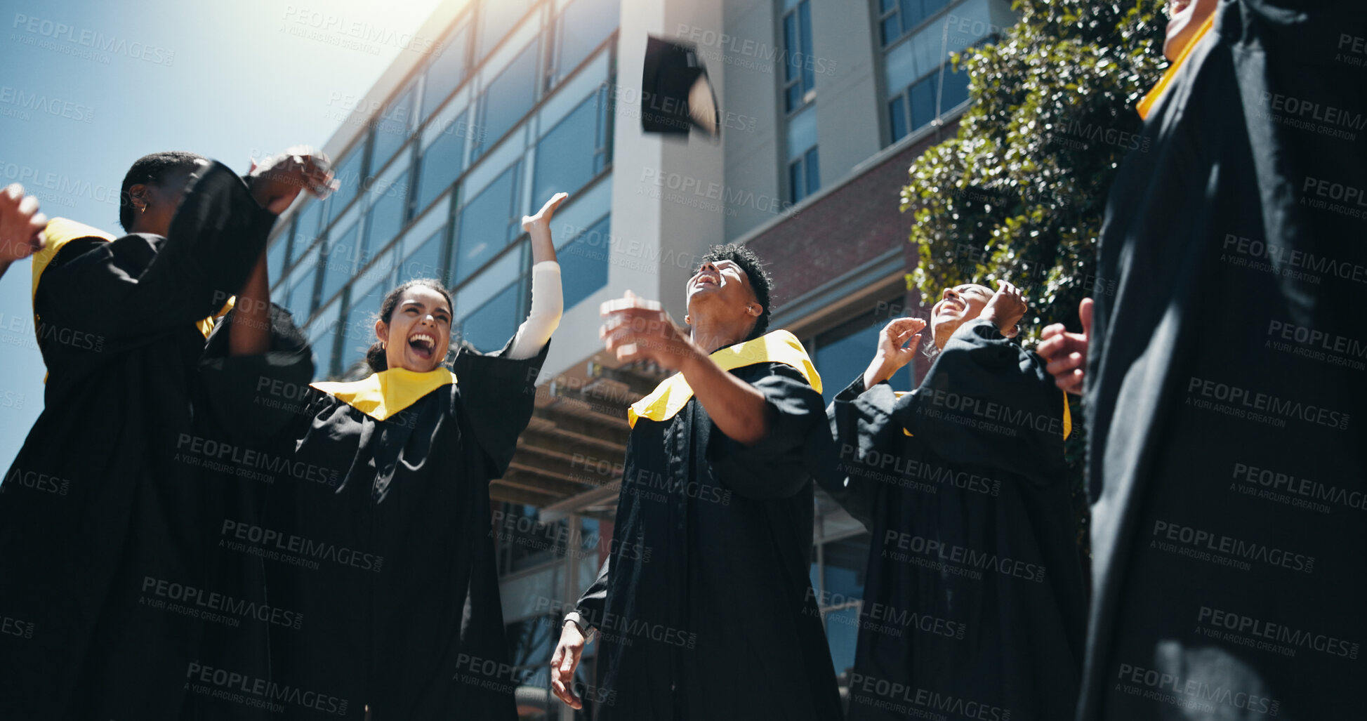 Buy stock photo Education, graduation and throw with group of friends on college or university campus together. Celebration, excitement and success with happy graduate or student people cheering for milestone goals