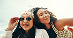 Happy women, sunglasses and summer with freedom for holiday, beach trip or outdoor vacation. Female people, friends or smile with fashion for fresh air, fun travel or bonding together by ocean coast