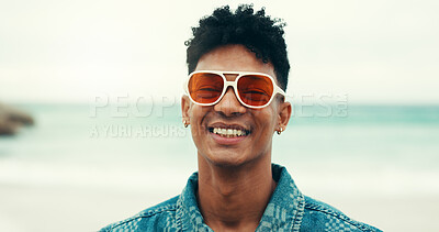 Buy stock photo Portrait, beach and man with sunglasses, smile and fashion for holiday, adventure or summer vacation. Happy, travel and person with shades, ocean and confidence with weekend trip to Miami sea