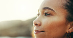 Happy woman, face or vision with beach sunset for fresh air, vacation or holiday dream in nature. Calm, female person or profile of thoughtful tourist with smile for serenity, freedom or summer break