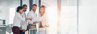 Buy stock photo Banner, business people and paperwork for diversity, collaboration and advice as feedback in office. Group, document and discussion as teamwork, lens flare and mentorship in brainstorming for company