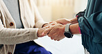 Healthcare, empathy and holding hands for support, trust and physiotherapist with elderly patient. Clinic, medical professional and caregiver for senior care, people or appointment for rehabilitation