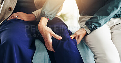 Buy stock photo Hands, physiotherapist and patient with knee pain on bed for injury recovery, rehabilitation or joint treatment. Physical therapy, professional and person in clinic with assessment for osteoarthritis