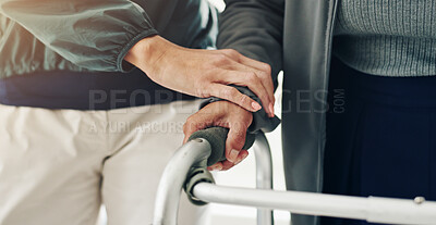 Buy stock photo Healthcare, empathy and holding hands for support, walker or physiotherapist with elderly patient. Clinic, medical professional and caregiver for senior care, people or appointment for rehabilitation