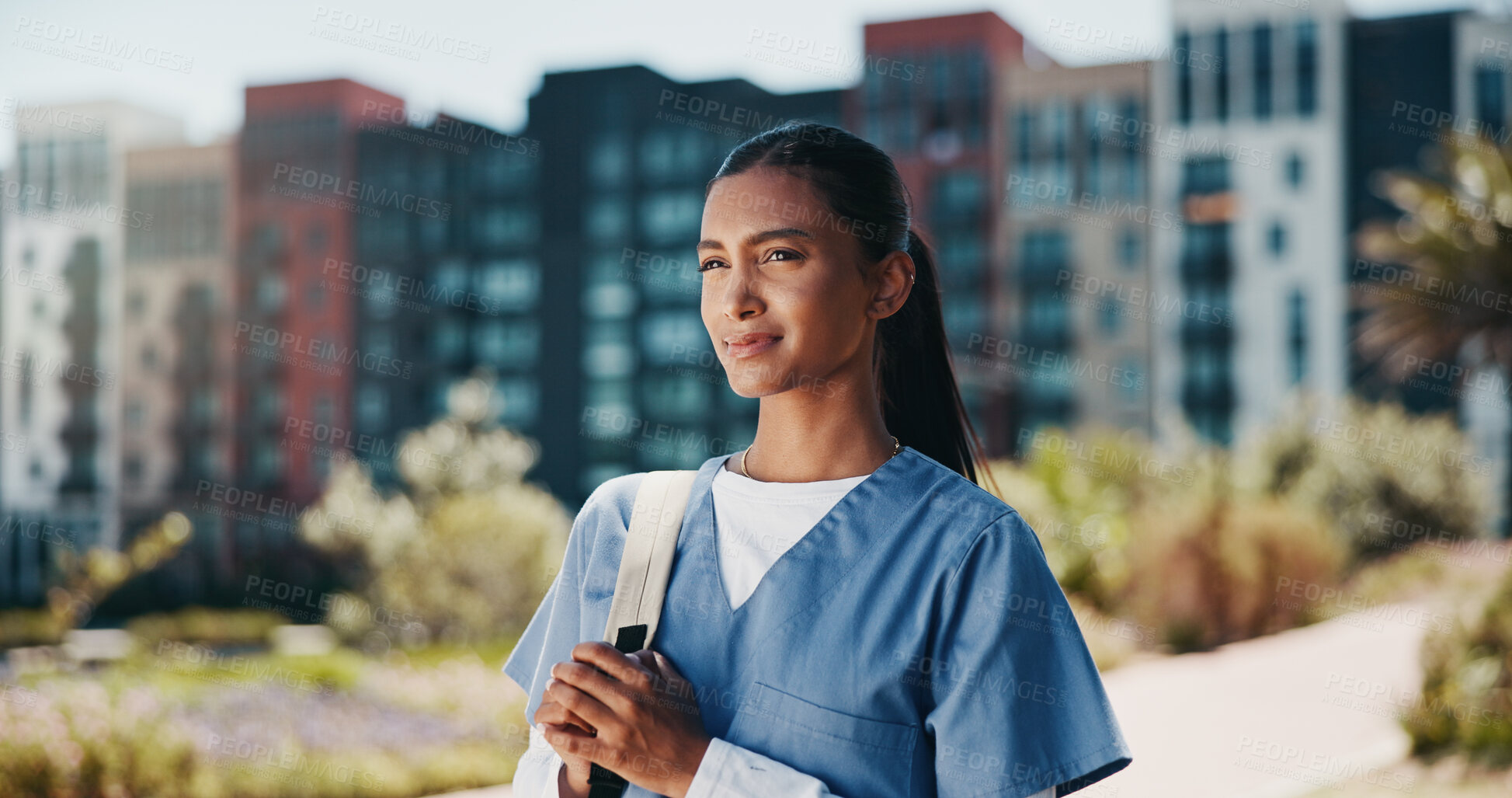 Buy stock photo Nurse, woman and thinking of healthcare outdoor for health training program, residency and surgery nostalgia. Medical school, student and thoughtful with backpack on campus for education and career