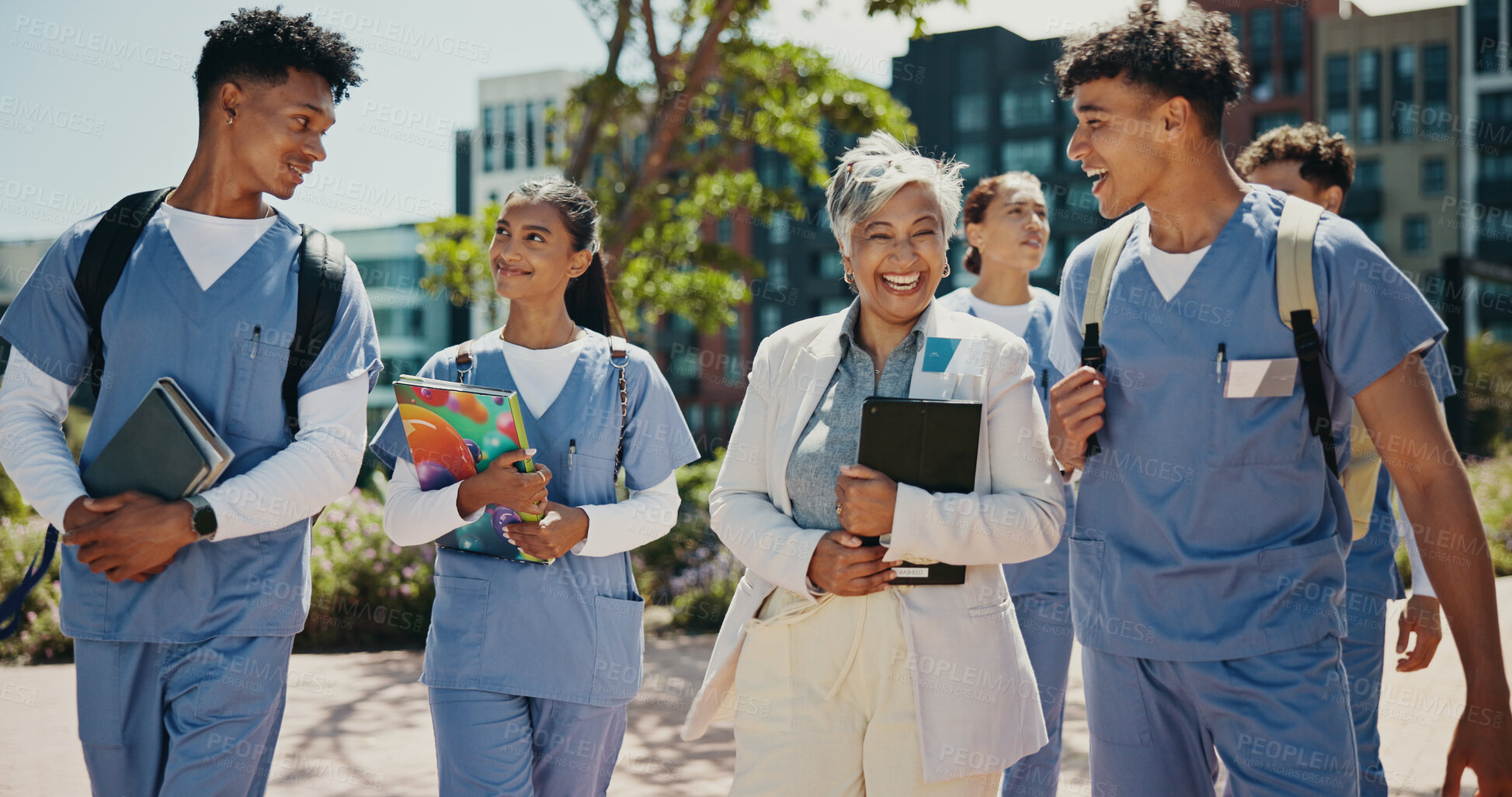 Buy stock photo Medical student, happy and professor with people in outdoor for college, healthcare and teacher. Scholarship, internship and doctors with students on hospital campus for assignment and education