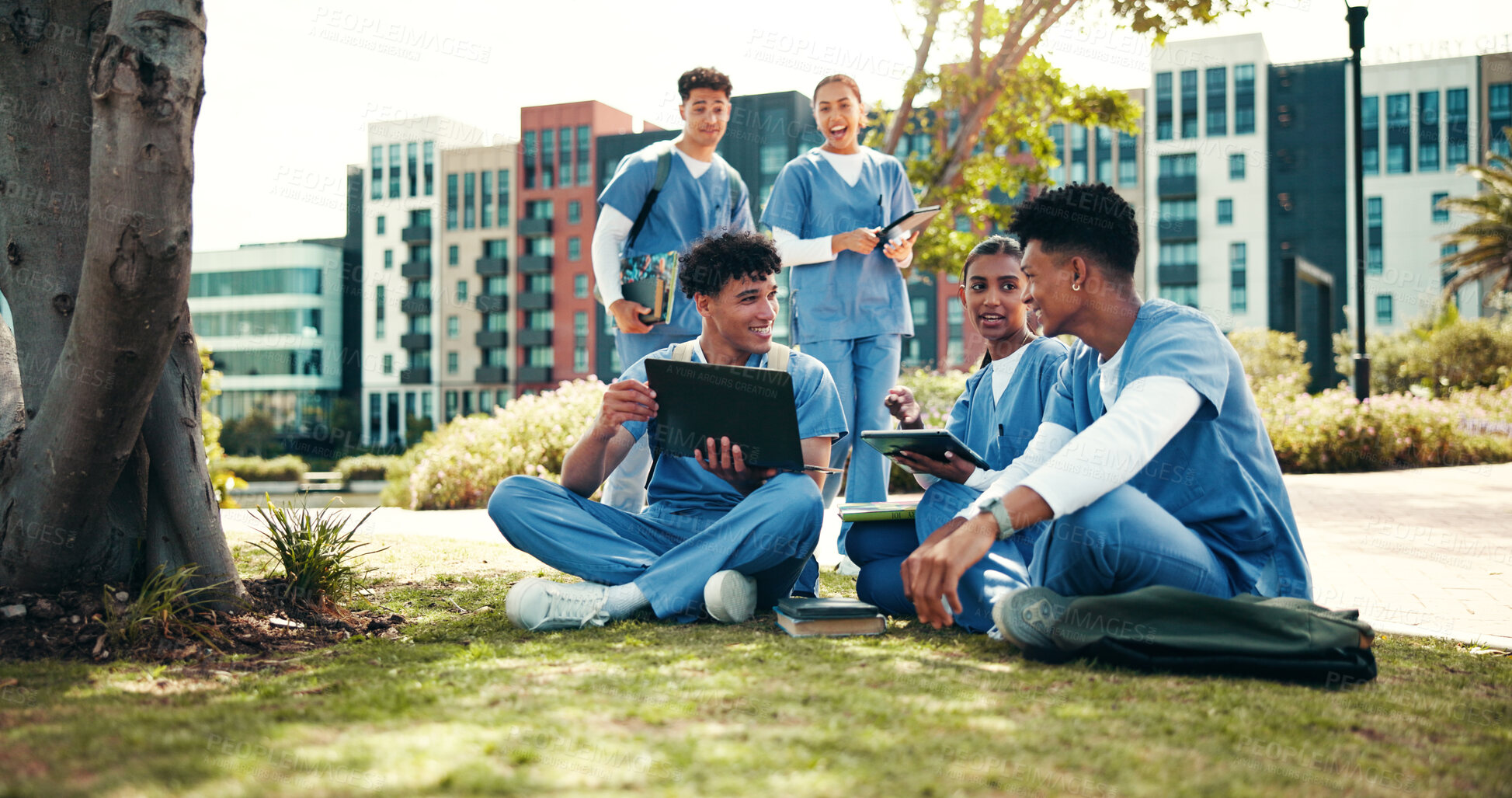 Buy stock photo Medical student, studying and online with people in outdoor for college, healthcare and research. Scholarship, internship and doctors with students on hospital campus for assignment and education