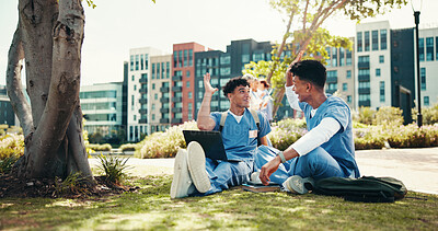 Buy stock photo Medical student, high five and laptop with people in outdoor for college success, healthcare and support. Scholarship, internship and doctors with friends on hospital campus for achievement and team