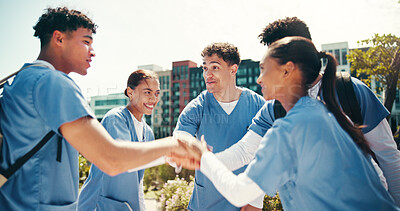Buy stock photo Medical success, students and support with hands together outdoor for training program feedback or board exam results. Diversity, people and excited in circle for healthcare practice and celebration