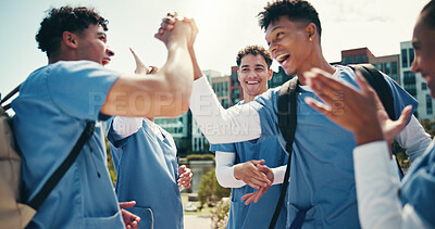 Buy stock photo Medical success, students and happy with handshake outdoor for training program support or board exam results. Excited group, people and hand gesture for healthcare practice feedback and cheering