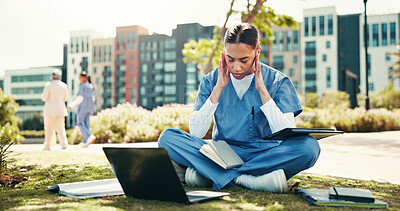 Buy stock photo Frustrated woman, medical student or laptop with stress, anxiety or pressure for studying PHD at campus. Female person, nurse or healthcare intern with headache or migraine for deadline at med school
