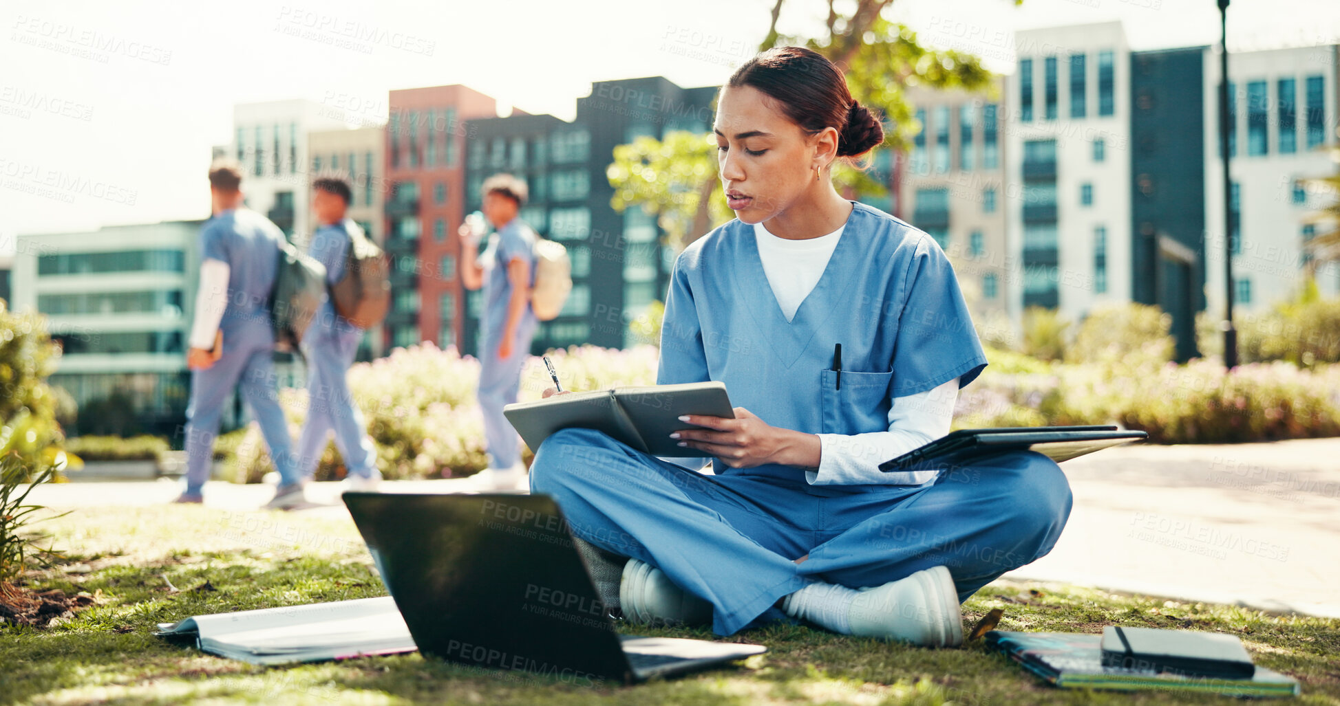Buy stock photo Woman, nurse or student writing with book for internship, studying or research at med school. Female person, healthcare candidate or intern taking notes with laptop for medical exam or test at campus