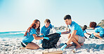 Beach, volunteer and people cleaning trash together for pollution, community service or earth day. Climate change, collaboration and recycling team at ocean with garbage, bag or social responsibility