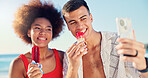 Couple, ice cream and selfie with smile at beach in summer, bonding and interracial love with post on web. People, man and woman with photography, memory and desert with social media on vacation