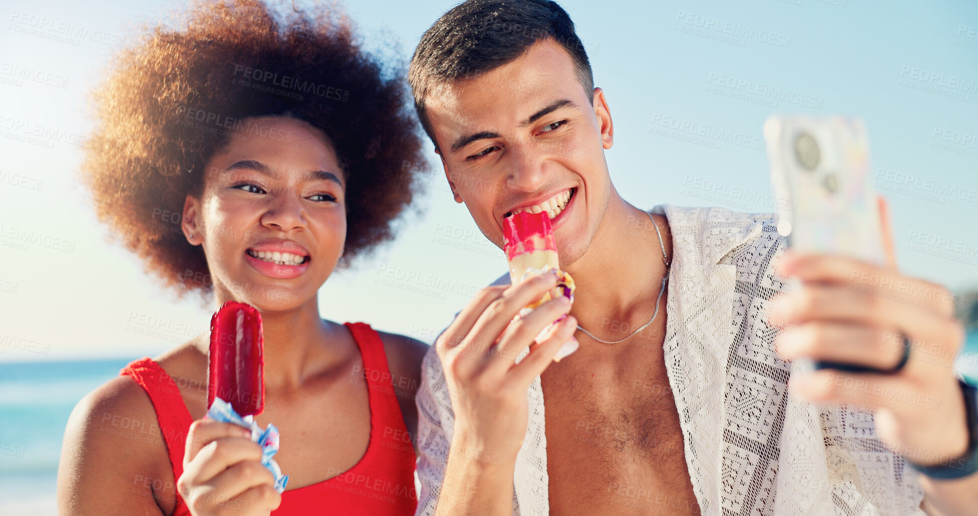 Buy stock photo Couple, ice cream and selfie with smile at beach in summer, bonding and interracial love with post on web. People, man and woman with photography, memory and desert with social media on vacation