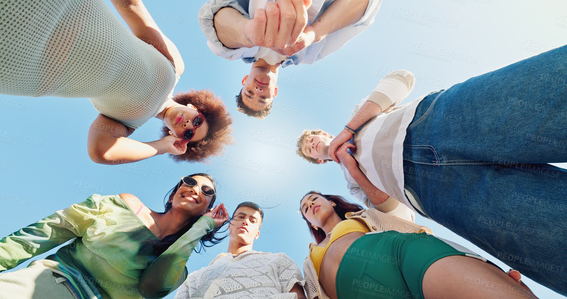 Buy stock photo Happy people, below and circle with unity or blue sky for fashion, style or summer together in nature. Low angle, group or friends with stylish clothing in huddle for bonding, holiday or weekend