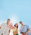 Friends, selfie and gen z group in low angle, blue sky or fashion with mockup space for portrait in summer. Woman, men and hand for photography, memory or profile picture with streetwear in Colombia