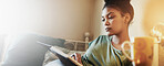 Home, woman and student reading book for learning, knowledge or philosophy to relax on banner space. Textbook, girl and studying on sofa in living room for college test, education and information