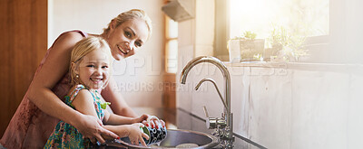 Buy stock photo Kitchen, mother and happy with girl washing dishes on portrait for bonding and support at home. Apartment, banner and parent with kid for hygiene with teaching or help for child development
