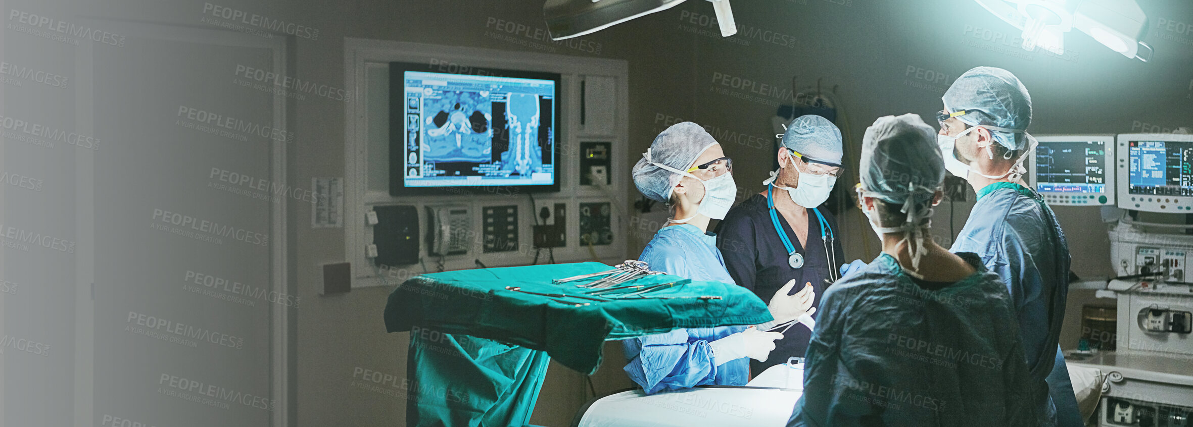 Buy stock photo Planning, operation and surgeons for surgery, teamwork and discussion for healthcare. Dark, hospital theater and people with MRI, procedure and collaboration for radiology and treatment in ICU clinic