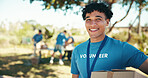 Man, excited and portrait of volunteer in nature with community service, NGO or donation project. Happy, confident and face of male charity worker with confidence outdoor in field for social activism