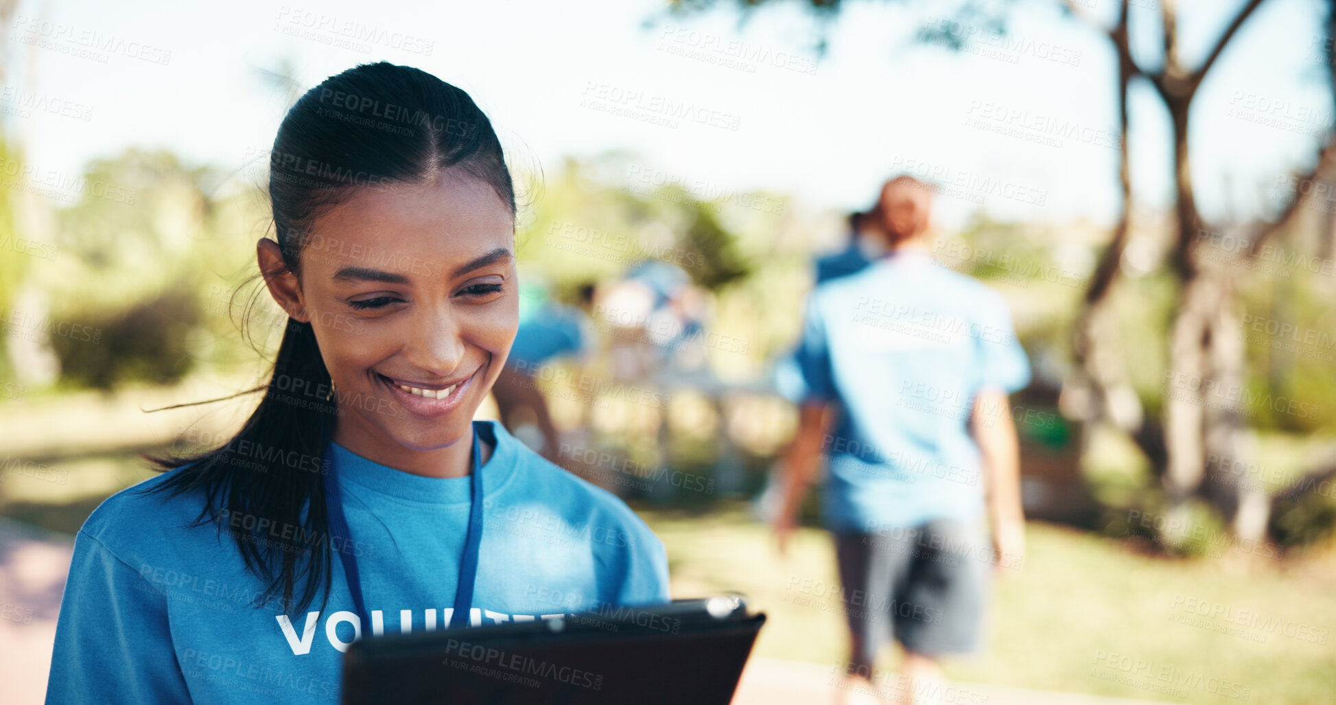 Buy stock photo Charity, smile and tablet with woman volunteer outdoor in park for community food drive or donation. Activism, checklist and schedule with happy person as welfare worker for NGO or non profit