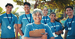 Charity, leadership and portrait of volunteer team outdoor in park for community food drive or donation. Activism, clipboard and smile with group of people as welfare workers for NGO or non profit