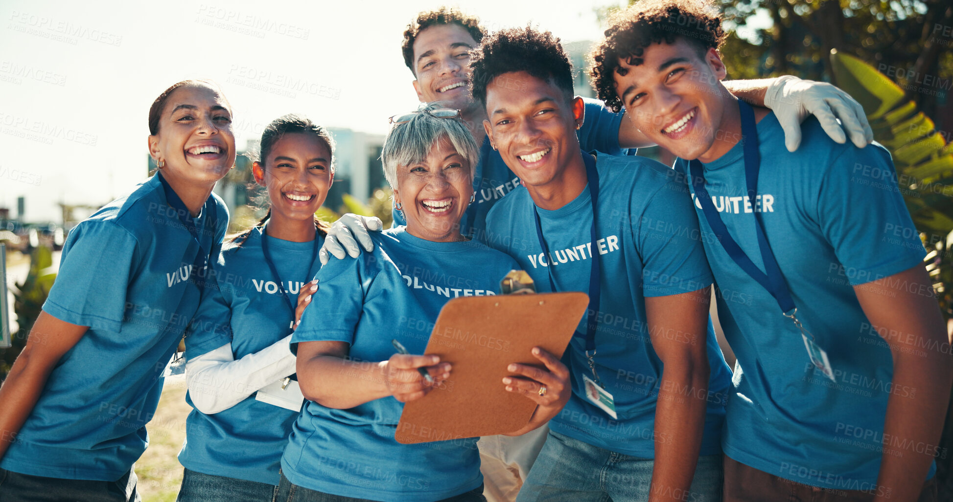 Buy stock photo Portrait, happy and group with clipboard, volunteers and joy for collaboration, charity and fundraiser. Outdoor, hug and mature woman with team, smile and good news for community service and USA