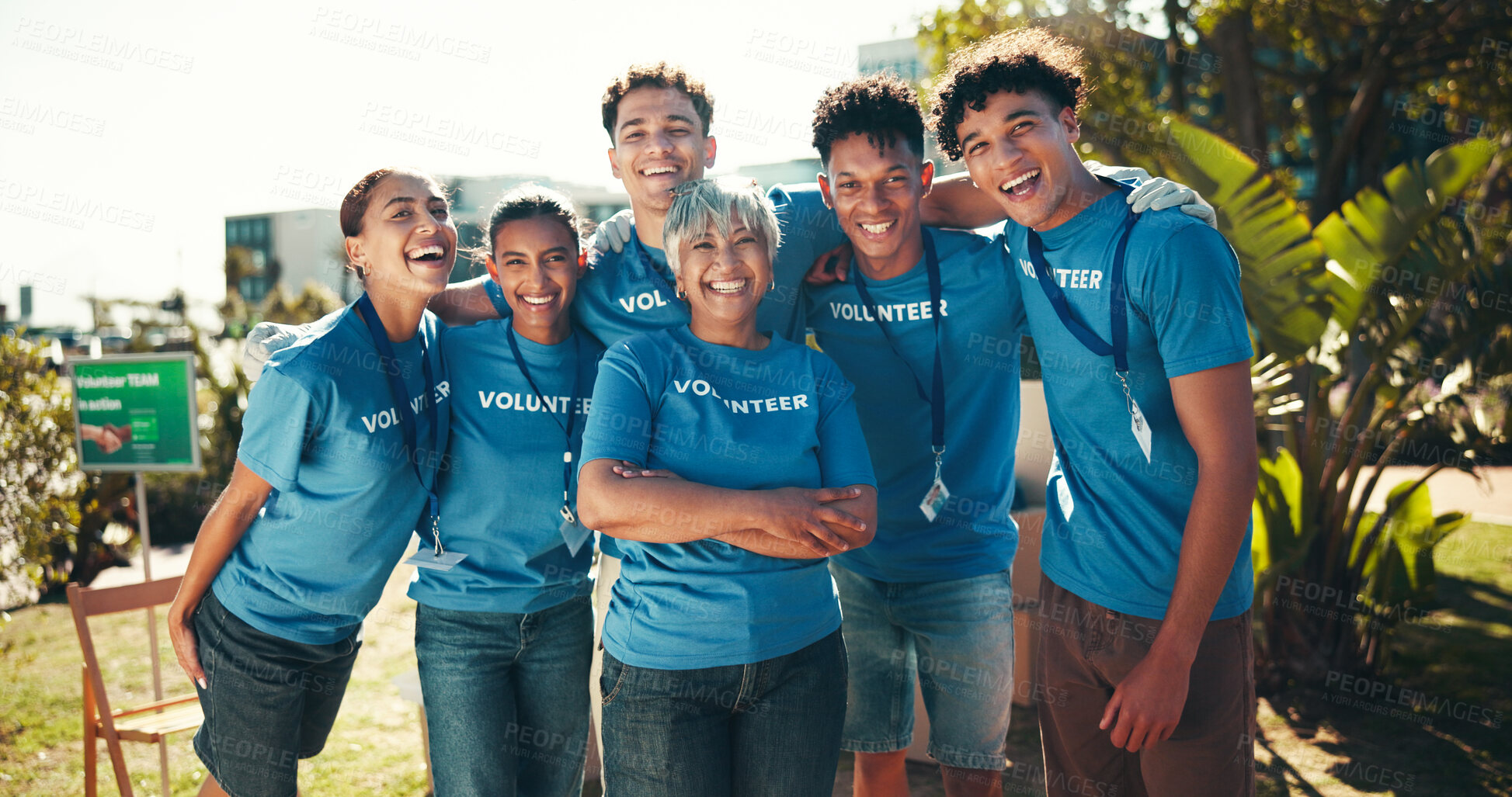 Buy stock photo Portrait, happy and group of volunteers, ngo and kindness for charity, collaboration and mature woman. Outdoor, people and coordinator with arms crossed, unity and smile for community service and USA