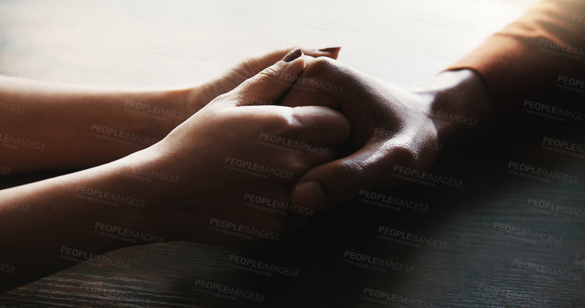 Buy stock photo Couple, holding hands and trust on table at house for compassion, partnership and consoling of depression. People, support and comfort with relationship crisis, partner empathy and loyalty connection