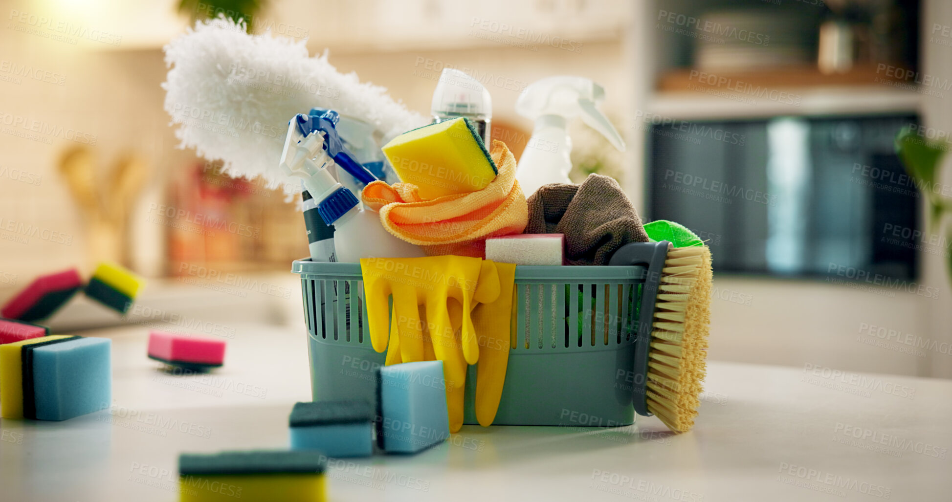 Buy stock photo Sponge, product and home with basket, sanitary bottle and detergent for daily chores, gloves or safety. Background, tools and spring cleaning as equipment, soap and hygiene for disinfectant in house