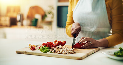 Buy stock photo Hands, cook and healthy food in kitchen for recipe, meal prep and cutting in cooking for nutrition. Person, chopping board and culinary arts with vegetables, ingredients and apron for cuisine in home