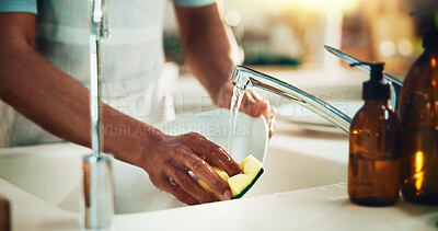 Buy stock photo Person, hands and washing dishes in kitchen for responsibility, dirt removal and hygiene with foam. Man, plate and water in home for bacteria prevention, cleaning or soap on sponge for disinfection