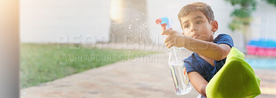 Buy stock photo Cleaning, spray bottle and window with boy outdoor in garden of home for chores or responsibility. Bacteria, dirt and disinfectant with child washing glass in backyard for housework or hygiene