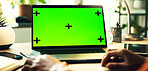 Person, hands and laptop with green screen for online advertising, marketing or software app at home office. Closeup, user or computer with chromakey display, mockup space or tracking markers for UI