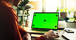 Person, freelancer and laptop with green screen or mockup space for online advertising, marketing or UI at home office. Closeup, user or computer with chromakey display or tracking markers for UX