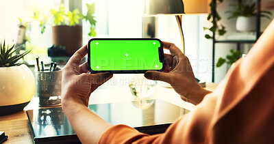 Buy stock photo Phone, green screen and hands of person in home office with tracking marker, ux design or web search. Smartphone, connection and freelancer on mobile app for communication, networking or online space