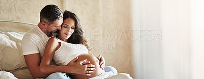 Buy stock photo Relax, pregnancy and couple in bedroom in home with love, bonding and marriage commitment to family. Rest, maternity leave and man embracing pregnant woman for prenatal care connection in apartment.