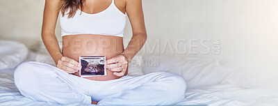 Buy stock photo Ultrasound, banner and stomach of pregnant woman in bedroom for scan, wellness and growth. Mockup space, baby development and pregnancy picture with closeup of person at home for sonogram photography