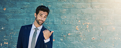 Buy stock photo Pointing, portrait and space with businessman on wall background for advertising or marketing. Banner, offer and promotion with confident corporate employee showing announcement or information