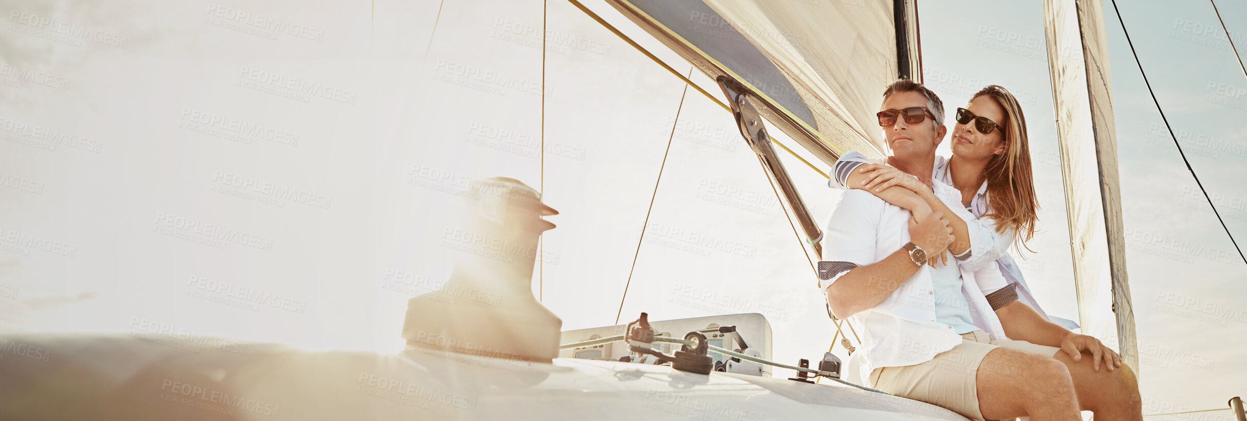 Buy stock photo Travel, sailing and couple on boat at sunset for cruise on holiday, vacation and journey. Happy, banner space and man and woman on yacht, luxury transport and ship for adventure, tourism and bonding