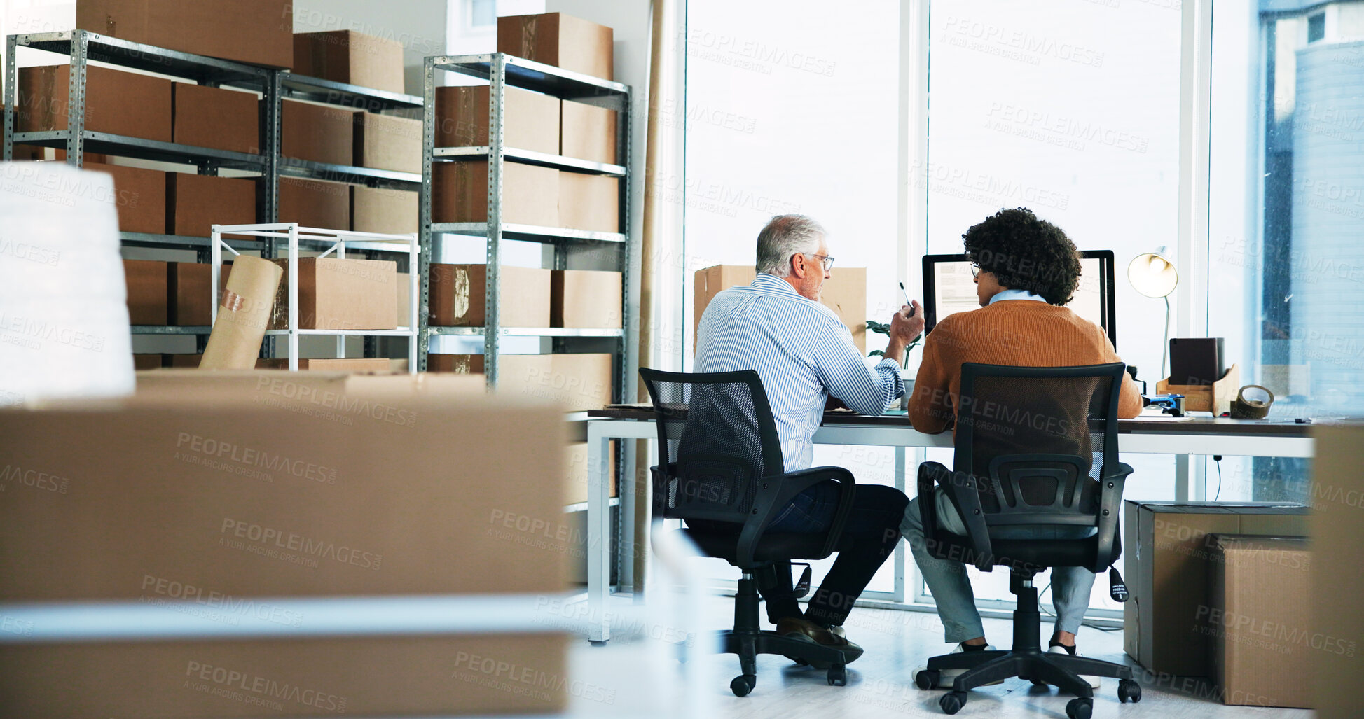 Buy stock photo People, talking and computer for distribution in office of schedule planning, order info and logistics. Back, men and discussion of ecommerce delivery, product packaging and supply chain at warehouse