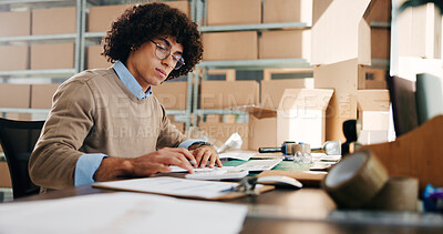 Buy stock photo Man, writing and paperwork for distribution in warehouse, inventory update and logistics information. Male person, documents and ecommerce schedule of stock checklist, supply chain and order feedback