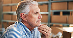 Thinking, logistics and mature businessman in office with cardboard boxes for shipping plan. Decision, question and male supply chain manager with admin for package, order or parcel distribution.