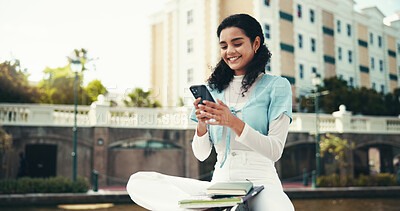 Buy stock photo Woman, student and relax in city with phone, social media and happy for class schedule. Girl, undergrad and mobile at Brazil university with connectivity, meme and smile for networking on study break