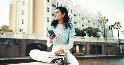 Buy stock photo Vision, phone and student with woman in city for scholarship, networking app and reflection. Thinking, college application and opportunity with person in outdoor of Brazil for email and university