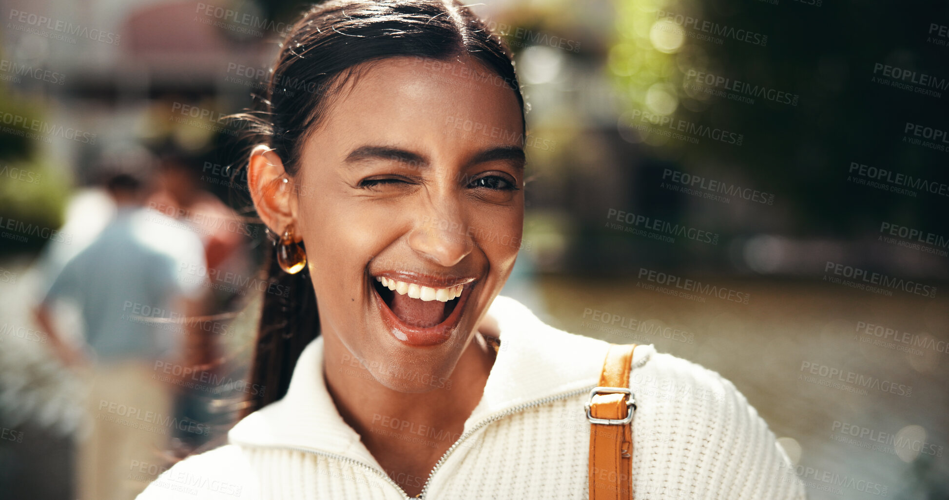 Buy stock photo Excited, portrait and woman on vacation, wink and happy for international trip, outdoor and tourism. Travel, tourist and student on spring break, location and Indian person on holiday and Mumbai