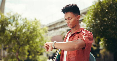 Buy stock photo Student, man and check watch at campus for reminder, schedule or class with backpack at college. Person, clock and time at university for education, outdoor and learning for scholarship in Costa Rica