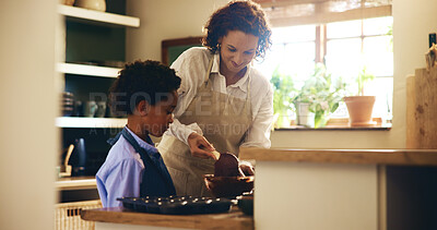 Buy stock photo Baking, teaching and child with mother in kitchen for skill development with chocolate cupcakes. Learning, bonding and boy kid cooking cookies, muffins or dessert with chef mom together in home.