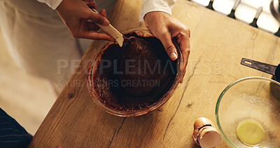 Buy stock photo Hands, person and chocolate mixture for baking in bowl for Christmas dessert, cake and meal prep in kitchen. Closeup, baker and chef at home with culinary skills or talent for snack and cupcakes
